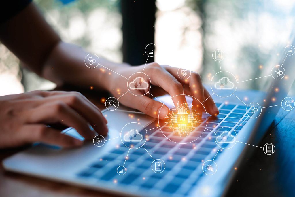 hands on laptop keyboard